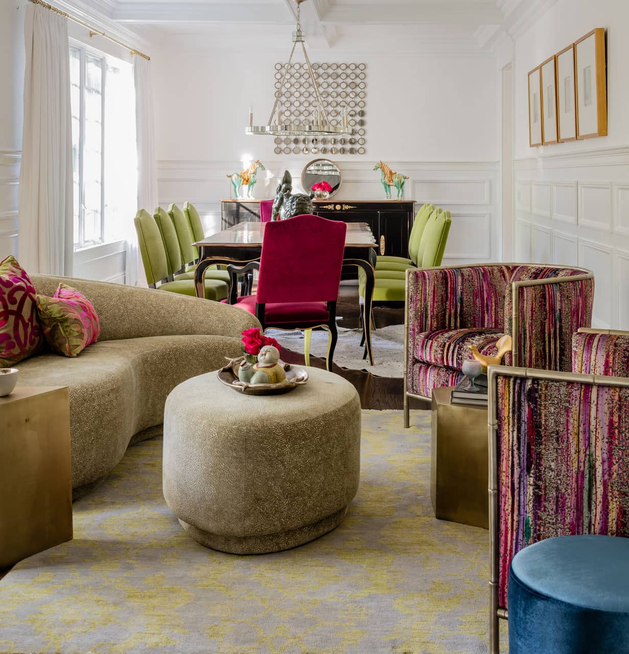 Colorfully upholstered tub chairs were the inspiration for magenta and lime green touches found throughout the elongated space. 